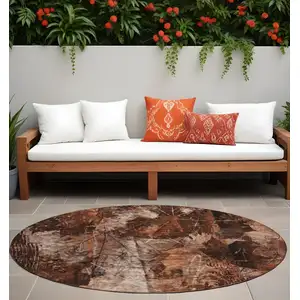 Photo of 8' Round Orange Round Floral Washable Non Skid Indoor Outdoor Area Rug