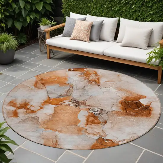 Orange and Ivory Round Abstract Washable Non Skid Indoor Outdoor Area Rug Photo 1