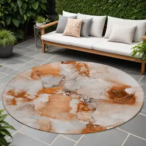 Photo of 8' Round Orange and Ivory Round Abstract Washable Non Skid Indoor Outdoor Area Rug