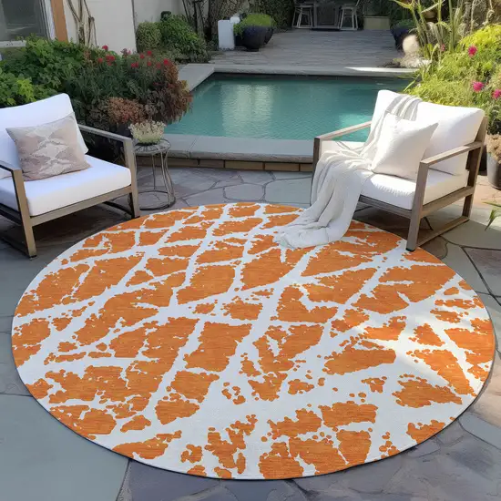 8' Round Orange and White Round Abstract Washable Non Skid Indoor Outdoor Area Rug Photo 8