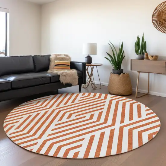 8' Round Orange and White Round Geometric Washable Non Skid Indoor Outdoor Area Rug Photo 9