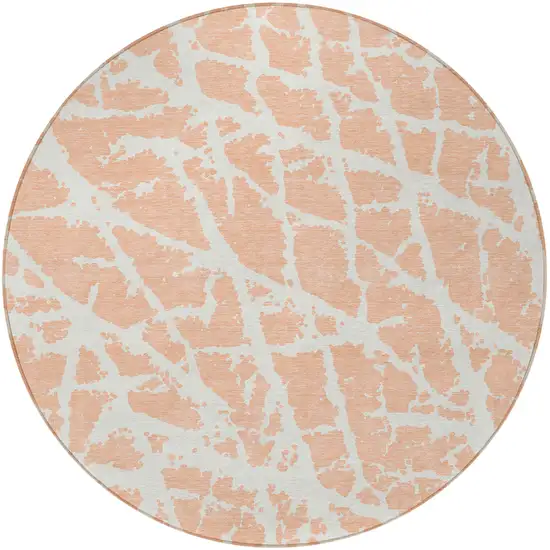 8' Round Peach and Ivory Round Abstract Washable Non Skid Indoor Outdoor Area Rug Photo 4