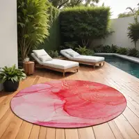 Photo of 8' Round Pink Round Abstract Washable Non Skid Indoor Outdoor Area Rug