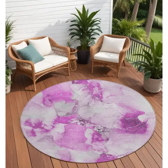 Pink and Ivory Round Abstract Washable Non Skid Indoor Outdoor Area Rug Photo 1