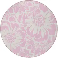 Photo of 8' Round Pink and Ivory Round Floral Washable Non Skid Indoor Outdoor Area Rug