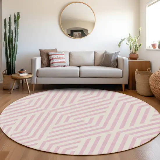 8' Round Pink and White Round Geometric Washable Non Skid Indoor Outdoor Area Rug Photo 9