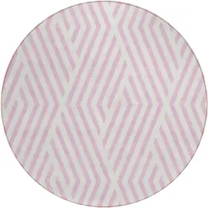 Photo of 8' Round Pink and White Round Geometric Washable Non Skid Indoor Outdoor Area Rug