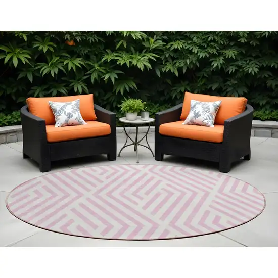 8' Round Pink and White Round Geometric Washable Non Skid Indoor Outdoor Area Rug Photo 1