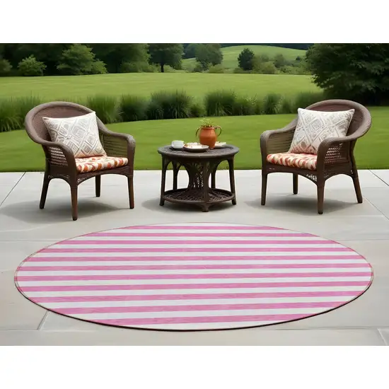 8' Round Pink and White Round Striped Washable Non Skid Indoor Outdoor Area Rug Photo 1