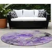 Photo of 8' Round Purple Round Abstract Washable Non Skid Indoor Outdoor Area Rug