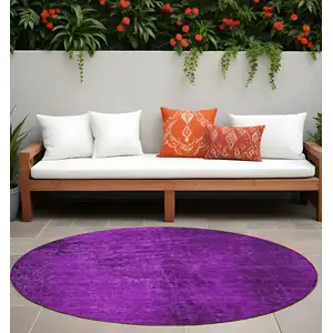 Photo of 8' Round Purple Round Abstract Washable Non Skid Indoor Outdoor Area Rug