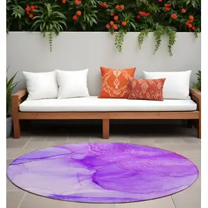 Photo of 8' Round Purple Round Abstract Washable Non Skid Indoor Outdoor Area Rug