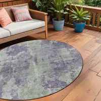 Photo of 8' Round Purple and Green Round Abstract Washable Non Skid Indoor Outdoor Area Rug