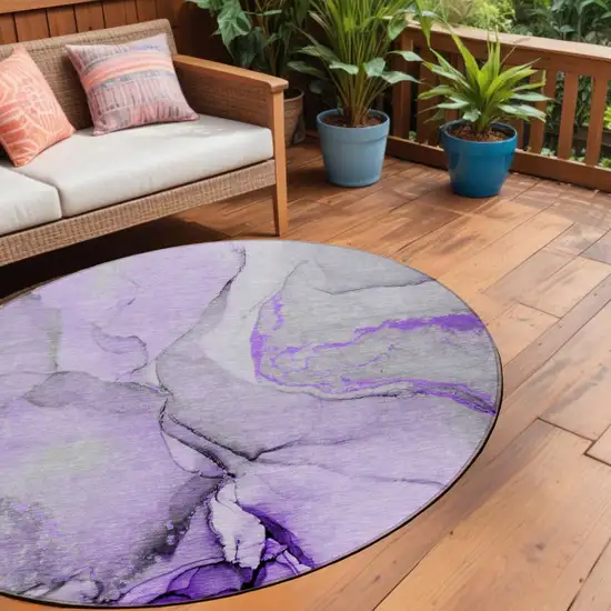 Purple and Ivory Round Abstract Washable Non Skid Indoor Outdoor Area Rug Photo 1