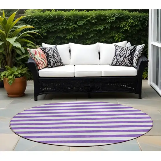 8' Round Purple and White Round Striped Washable Non Skid Indoor Outdoor Area Rug Photo 1