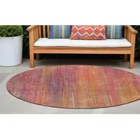 Photo of 8' Round Red and Orange Round Striped Washable Non Skid Indoor Outdoor Area Rug