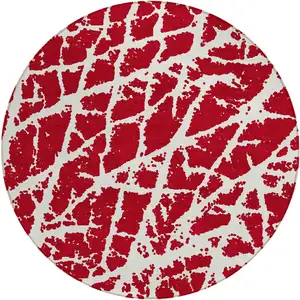 Photo of 8' Round Red and White Round Abstract Washable Non Skid Indoor Outdoor Area Rug