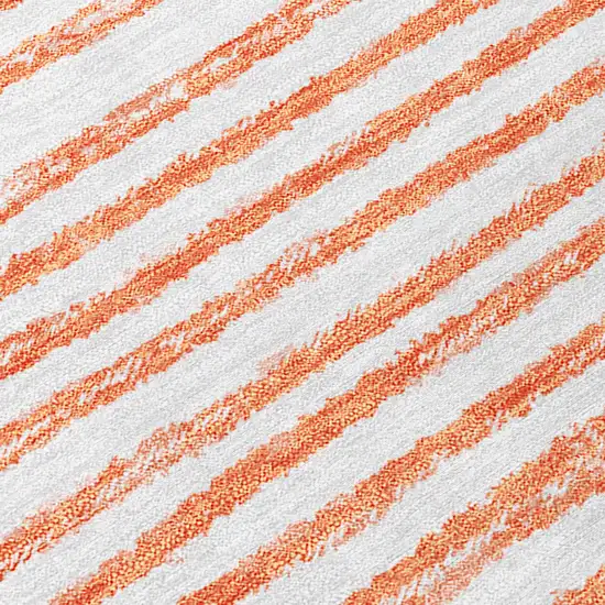 Orange and Ivory Round Abstract Washable Non Skid Indoor Outdoor Area Rug Photo 6