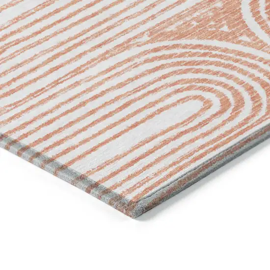 Orange and Ivory Round Abstract Washable Non Skid Indoor Outdoor Area Rug Photo 5