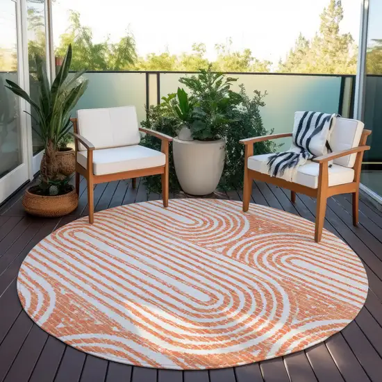 Orange and Ivory Round Abstract Washable Non Skid Indoor Outdoor Area Rug Photo 7