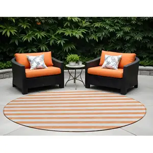 Photo of 8' Round Salmon Round Striped Washable Non Skid Indoor Outdoor Area Rug