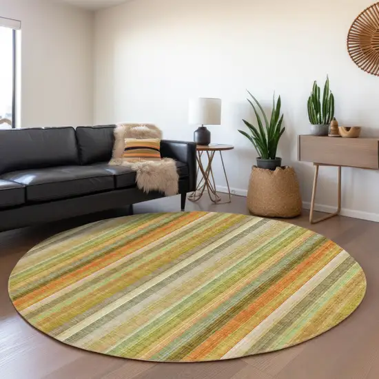 8' Round Tan Orange and Green Round Striped Washable Non Skid Indoor Outdoor Area Rug Photo 9