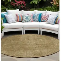 Photo of 8' Round Tan Round Abstract Washable Non Skid Indoor Outdoor Area Rug