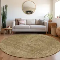 Photo of 8' Round Tan Round Abstract Washable Non Skid Indoor Outdoor Area Rug