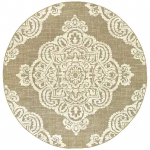 Photo of 8' Round Tan Round Oriental Stain Resistant Indoor Outdoor Area Rug