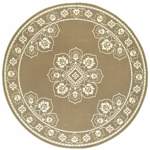 Photo of 8' Round Tan Round Oriental Stain Resistant Indoor Outdoor Area Rug