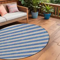 Photo of 8' Round Tan Round Striped Washable Non Skid Indoor Outdoor Area Rug