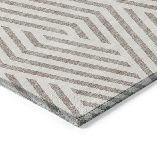 8' Round Taupe and Ivory Round Geometric Washable Non Skid Indoor Outdoor Area Rug Photo 6