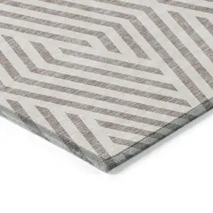 Photo of 8' Round Taupe and Ivory Round Geometric Washable Non Skid Indoor Outdoor Area Rug