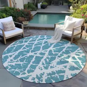 Photo of 8' Round Teal Round Abstract Washable Non Skid Indoor Outdoor Area Rug