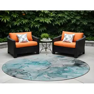 Photo of 8' Round Teal Round Abstract Washable Non Skid Indoor Outdoor Area Rug