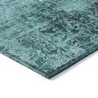 Photo of 8' Round Teal Round Abstract Washable Non Skid Indoor Outdoor Area Rug