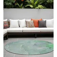 Photo of 8' Round Teal Round Abstract Washable Non Skid Indoor Outdoor Area Rug