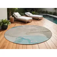 Photo of 8' Round Teal Round Abstract Washable Non Skid Indoor Outdoor Area Rug