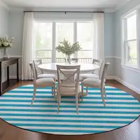 Photo of 8' Round Teal Round Striped Washable Non Skid Indoor Outdoor Area Rug