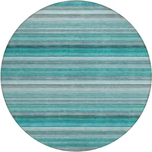 Photo of 8' Round Teal Round Striped Washable Non Skid Indoor Outdoor Area Rug