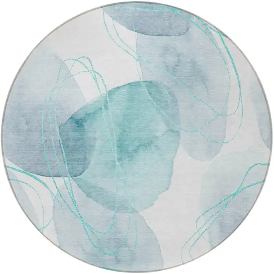 8' Round Teal and Ivory Round Abstract Washable Non Skid Indoor Outdoor Area Rug Photo 4