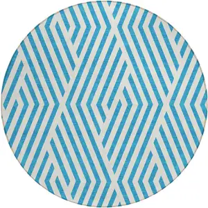 Photo of 8' Round Teal and White Round Geometric Washable Non Skid Indoor Outdoor Area Rug