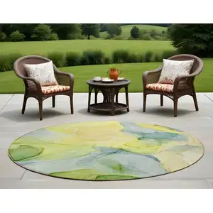 Photo of 8' Round Yellow Round Abstract Washable Non Skid Indoor Outdoor Area Rug