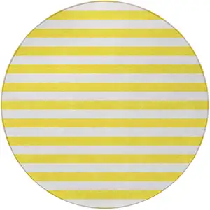 Photo of 8' Round Yellow and White Round Striped Washable Non Skid Indoor Outdoor Area Rug