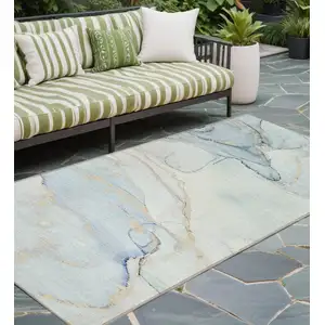 Photo of 8' Runner Beige and Blue Abstract Washable Non Skid Indoor Outdoor Runner Rug