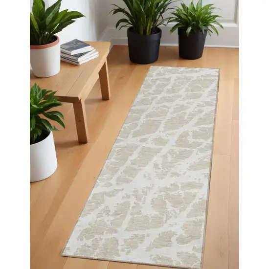 8' Runner Beige and Ivory Abstract Washable Non Skid Indoor Outdoor Runner Rug Photo 1