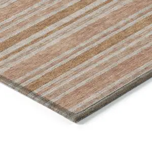 Photo of 8' Runner Beige and Orange Striped Washable Non Skid Indoor Outdoor Runner Rug