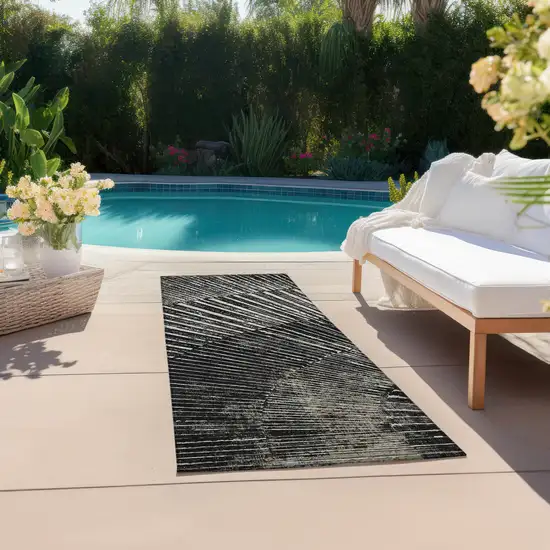 8' Runner Black and Ivory Abstract Washable Non Skid Indoor Outdoor Runner Rug Photo 8