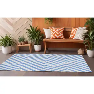 Photo of 8' Runner Blue and Ivory Geometric Washable Non Skid Indoor Outdoor Runner Rug