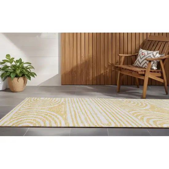 8' Runner Gold and White Abstract Washable Non Skid Indoor Outdoor Runner Rug Photo 1